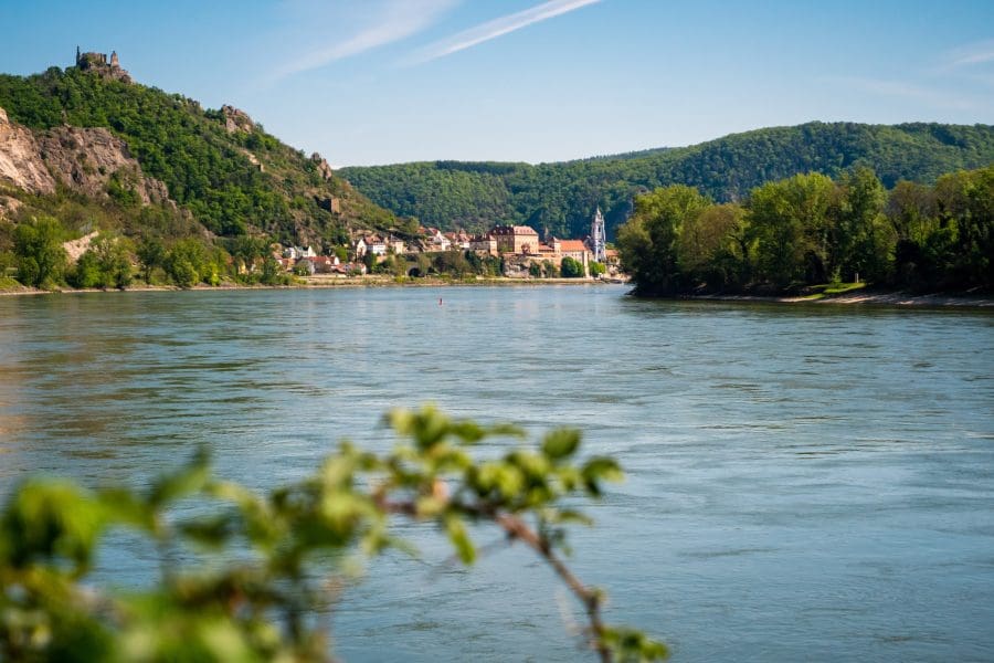 River Danube and Duernstein with the Kuenringer Castle and Blue and White Tower of the Abbey Church in the Wachau Valley