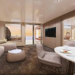 Rendered lounge with a sofa, round coffee table and a view of a hot tub on a sunset deck.