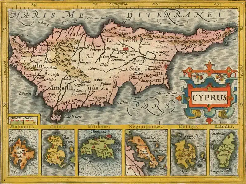 Historical map of Cyprus with labeled towns, decorative border, and a bold CYPRUS cartouche on the right side.