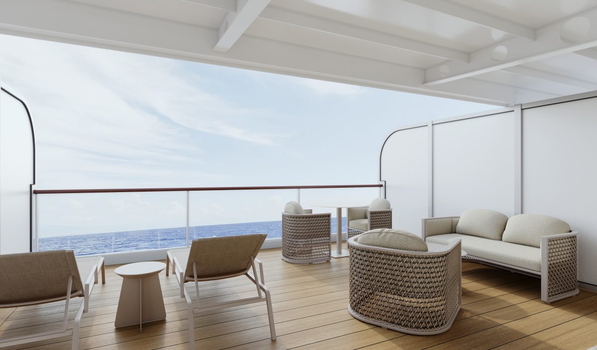 Elegant open-air lounge on a balcony with white furniture and wicker chairs overlooking the ocean horizon.