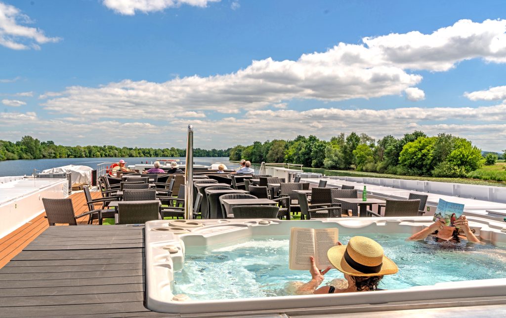 A lady in a pool enjoying Scenic River Cruises